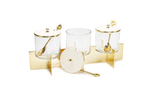 Load image into Gallery viewer, Three Glass Canister Set White Lids Gold Block Base